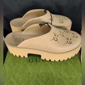 GUCCI WOMEN'S PLATFORM PERFORATED G SANDAL